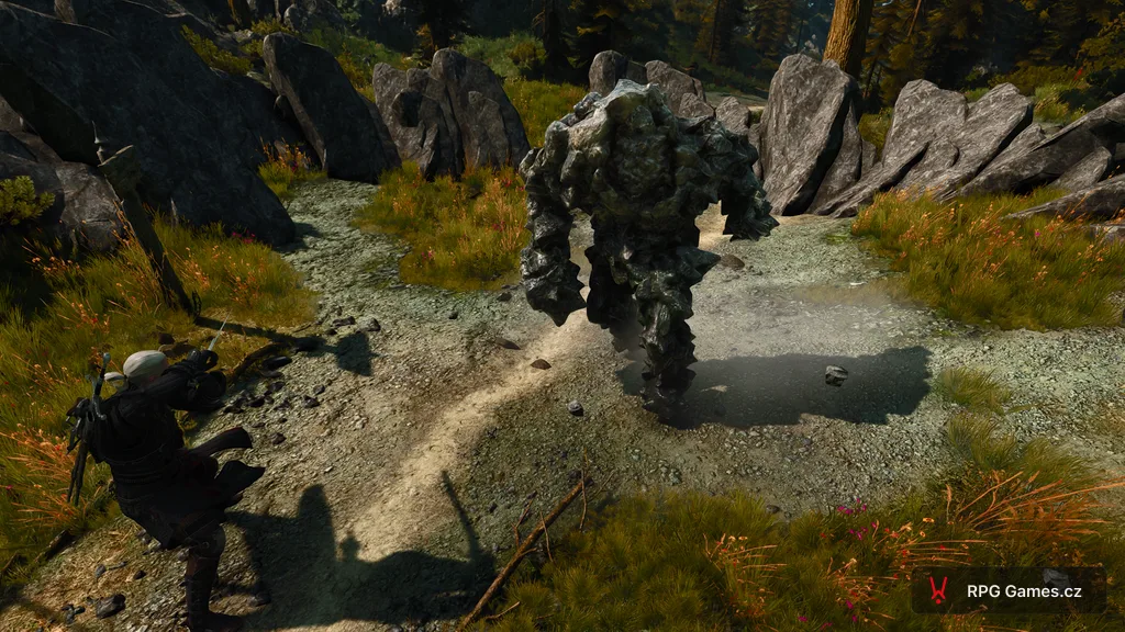 Geralt se stříbrným mečem proti Therazeneovi na cestě mezi skalami — pojmenovaný zemní elementál, Zaklínač 3