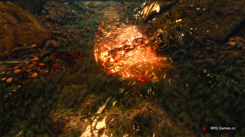 Geralt vrhá Igni na smečku vlků mezi skalami — ohnivá exploze, vlci v plamenech, Zaklínač 3